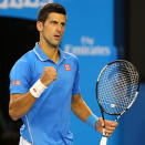 Djokovic reacts after taking the first set in a tie-breaker.