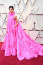 <p>The “Crazy Rich Asians” star looked fashion forward in a bright pink ruffled gown (with pockets) by Valentino. <em>[Photo: Getty]</em> </p>
