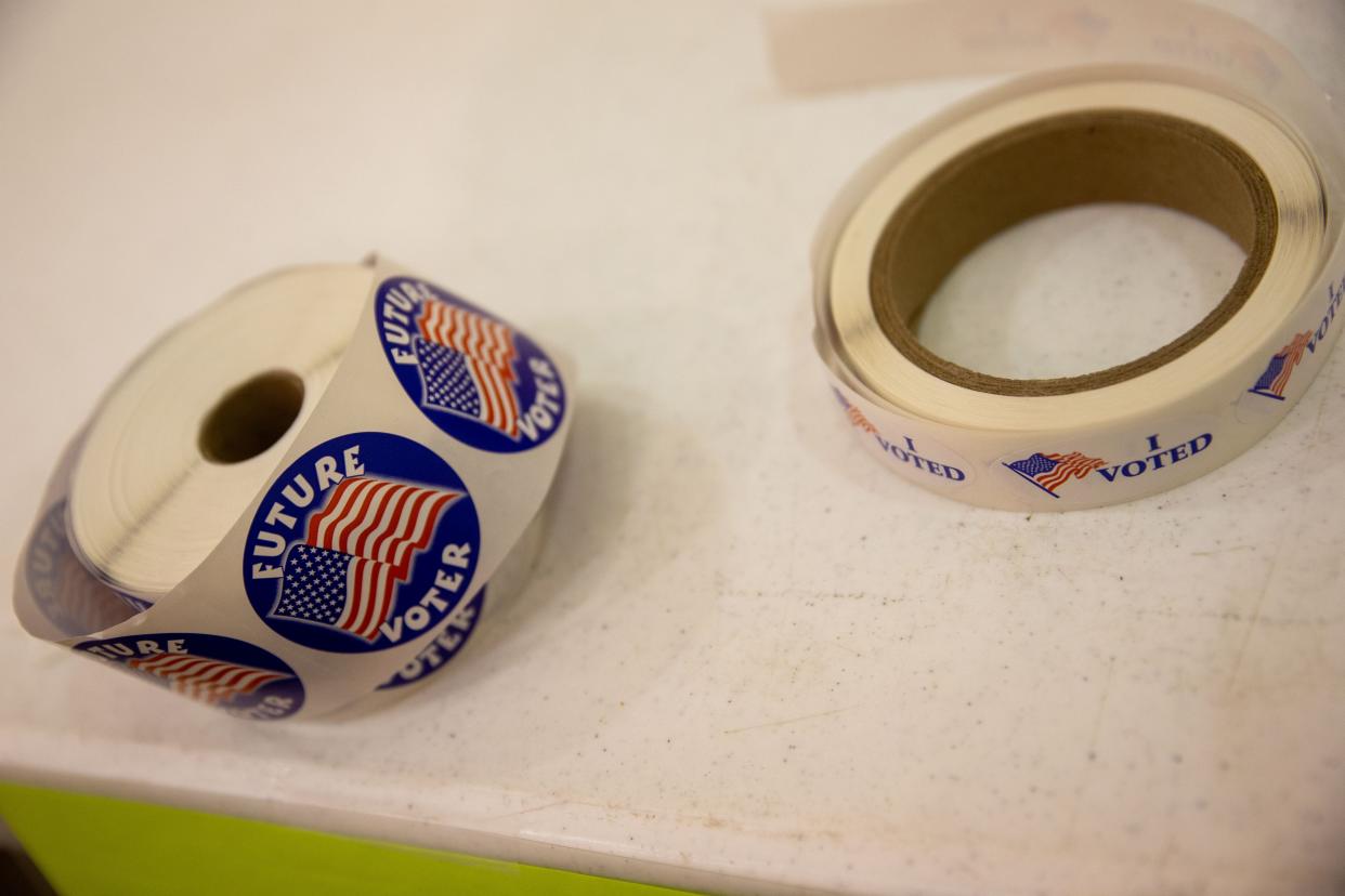 I voted stickers rest on the table of a Zeeland-area precinct Tuesday, May 3, 2022, at Beaverdam Ref. Church in Zeeland. 