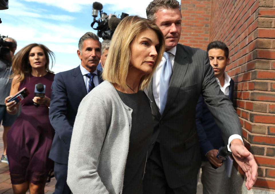 Closeup of Lori Loughlin outside a court house