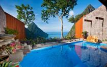 <p>For those who like their romantic, tropical vacations to feel, well, romantic and tropical, <a rel="nofollow noopener" href="http://www.travelandleisure.com/travel-guide/soufriere/hotels/ladera-resort" target="_blank" data-ylk="slk:Ladera;elm:context_link;itc:0;sec:content-canvas" class="link ">Ladera</a> is the place to go. Rooms are decked out in dark golden wood, with gauzy draperies breezily thrown over four-posters beds, though the main draw is the lack of a fourth wall. There’s nothing between you and those stunning Piton views. The resort isn’t technically an all-inclusive, but those who adore its restaurant, Dasheene, with its spectacular perch over the ocean and riffs on traditional St. Lucian dishes (sweet potato and coconut soup; roast conch; plantain gratin with coconut rum sauce) often pick the all-inclusive option. At $205 per person, per night, it includes three meals and all house-brand beverages. Be aware that there’s a dress code at dinnertime for both men and women.</p>