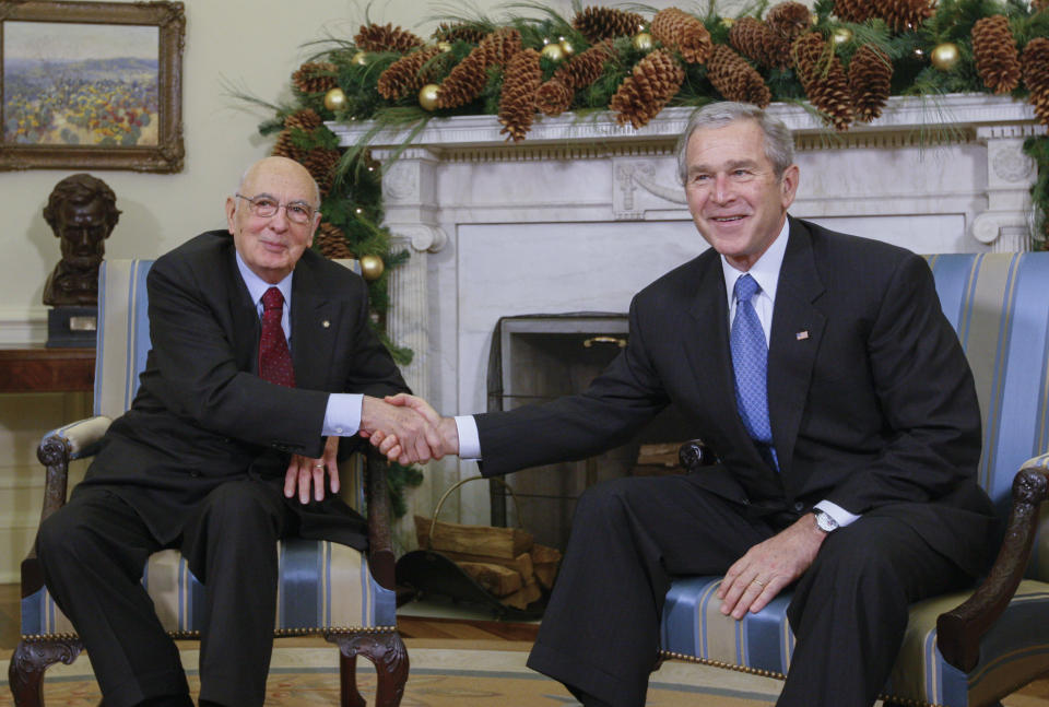FILE - President George W. Bush meets with Italy's President Giorgio Napolitano, left, in the Oval Office of the White House in Washington DC, Tuesday, Dec. 11, 2007. Giorgio Napolitano, the first former Communist to rise to Italy’s top job — president of the Republic — and the first president to be re-elected, has died Friday, Sept. 22, 2023. He was 98. (AP Photo/Charles Dharapak, File)