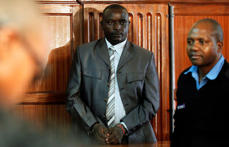 Nahashon Mutua, a former senior police officer at Ruaraka police station, stands in the dock inside the Mililani Law Courts in Nairobi, Kenya December 13, 2018. REUTERS/Njeri Mwangi