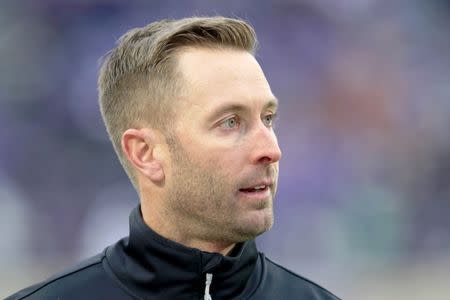 Nov 17, 2018; Manhattan, KS, USA; Texas Tech Red Raiders head coach Kliff Kingsbury questions a call by the officials during the first quarter against the Kansas State Wildcats at Bill Snyder Family Stadium. Mandatory Credit: Scott Sewell-USA TODAY Sports