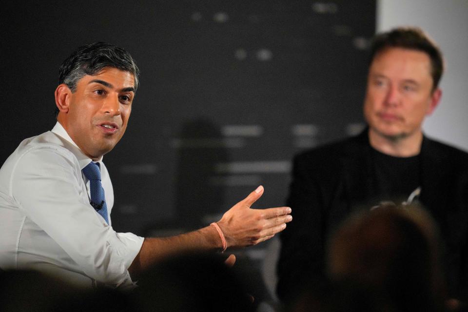 Britain's Prime Minister Rishi Sunak (L) attends an in-conversation event with X (formerly Twitter) CEO Elon Musk (R) in London on November 2, 2023, following the UK Artificial Intelligence (AI) Safety Summit. (Photo by Kirsty Wigglesworth / POOL / AFP) (Photo by KIRSTY WIGGLESWORTH/POOL/AFP via Getty Images)