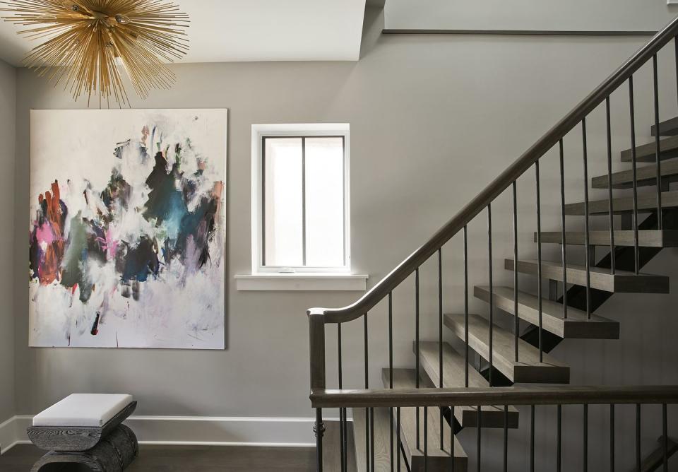 A townhouse with a wood staircase