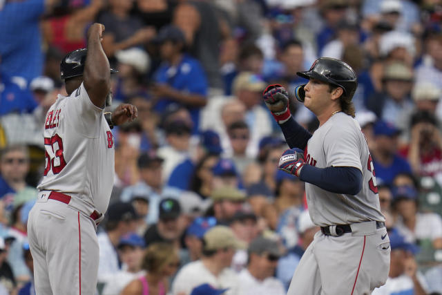 Bellinger hits a grand slam as Cubs cool off Red Sox 10-4