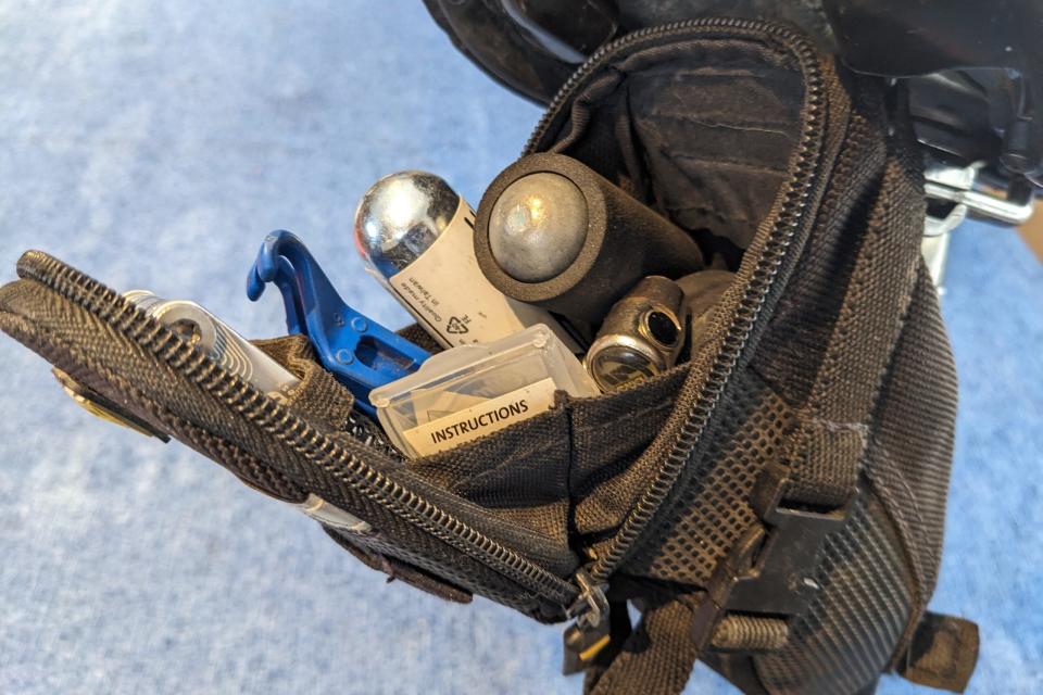 A look at the contents inside a bike saddle bag