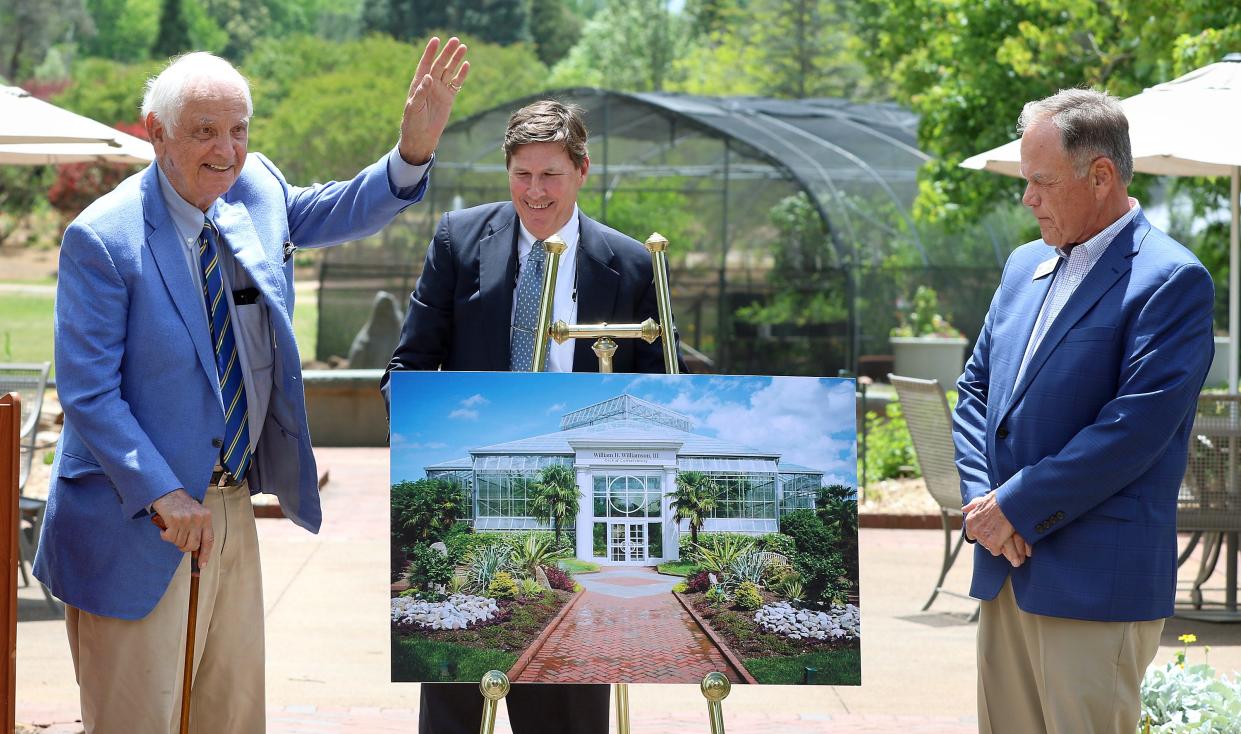 Bill Williamson waves to the crowd during the Thank You celebration for naming of the William H. Williamson III Orchid Conservatory held Thursday, May 12, 2022 at Daniel Stowe Botanical Garden.