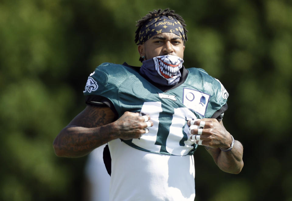 Philadelphia Eagles wide receiver DeSean Jackson adjusts his uniform during an NFL football training camp practice in Philadelphia, Monday, Aug. 17, 2020. (Yong Kim/Pool Photo via AP)