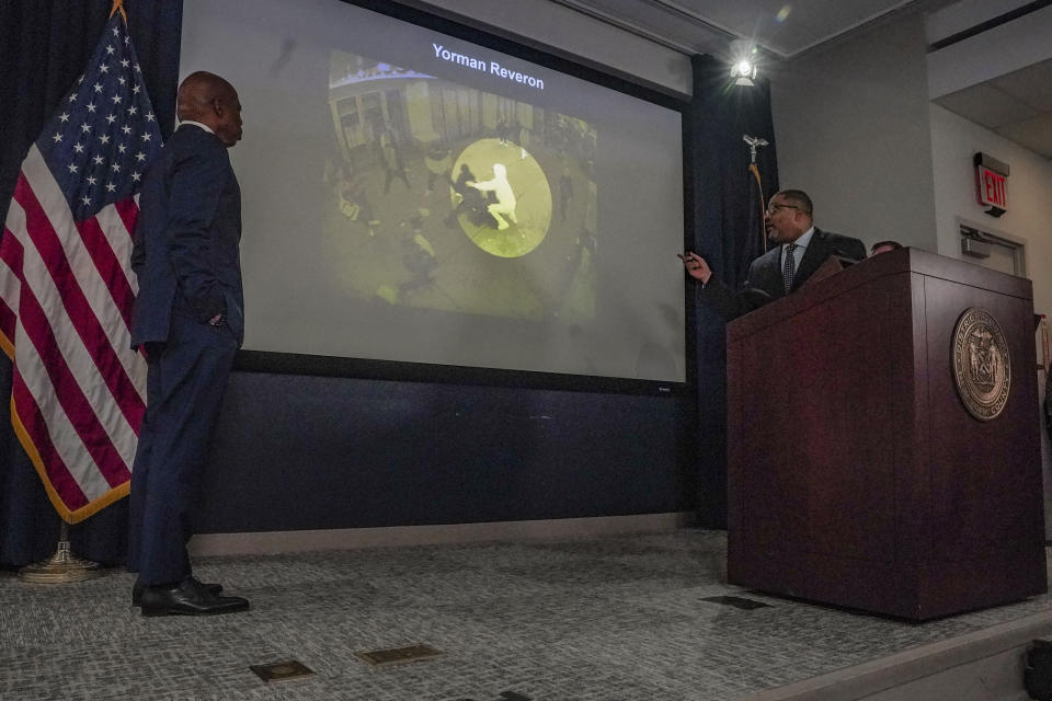 District Attorney Alvin Bragg, Mayor Eric Adams and NYPD Chief of Detectives Joseph Kenny hold a press conference to announce several charges for migrants involved in a Times Square brawl with police, Thursday, Feb. 8, 2024, in New York. (AP Photo/Bebeto Matthews)