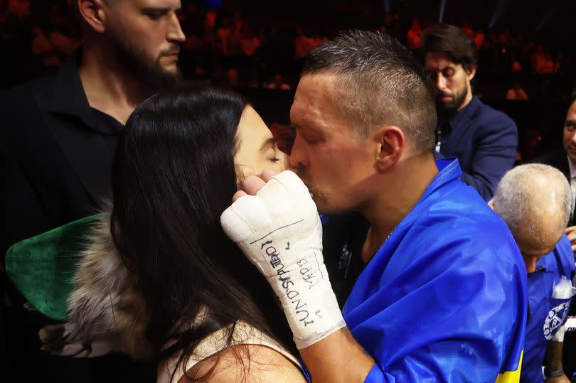 Usyk and his wife Katerina kiss after he beat Fury in Riyadh