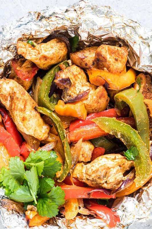 <p>Budget Delicious</p><p>These five-ingredient dinner packets are made with pantry staples, have minimal prep, and can be made on the grill or in the oven. The whole family will love these.</p><p><strong>Get the recipe:</strong> <strong><a href="https://budgetdelicious.com/chicken-fajita-foil-packets/" rel="nofollow noopener" target="_blank" data-ylk="slk:Easy Chicken Fajita Foil Packets;elm:context_link;itc:0;sec:content-canvas" class="link rapid-noclick-resp">Easy Chicken Fajita Foil Packets</a></strong></p><p><strong>Related: 61 <a href="https://parade.com/845295/lisamarcaurele-2/low-carb-keto-cinco-de-mayo-recipes/#gid=ci02a51388900f277c&pid=low-carb-mexican-chicken-lasagna" rel="nofollow noopener" target="_blank" data-ylk="slk:Low-Carb and Keto Mexican Recipes;elm:context_link;itc:0;sec:content-canvas" class="link rapid-noclick-resp">Low-Carb and Keto Mexican Recipes</a></strong></p>