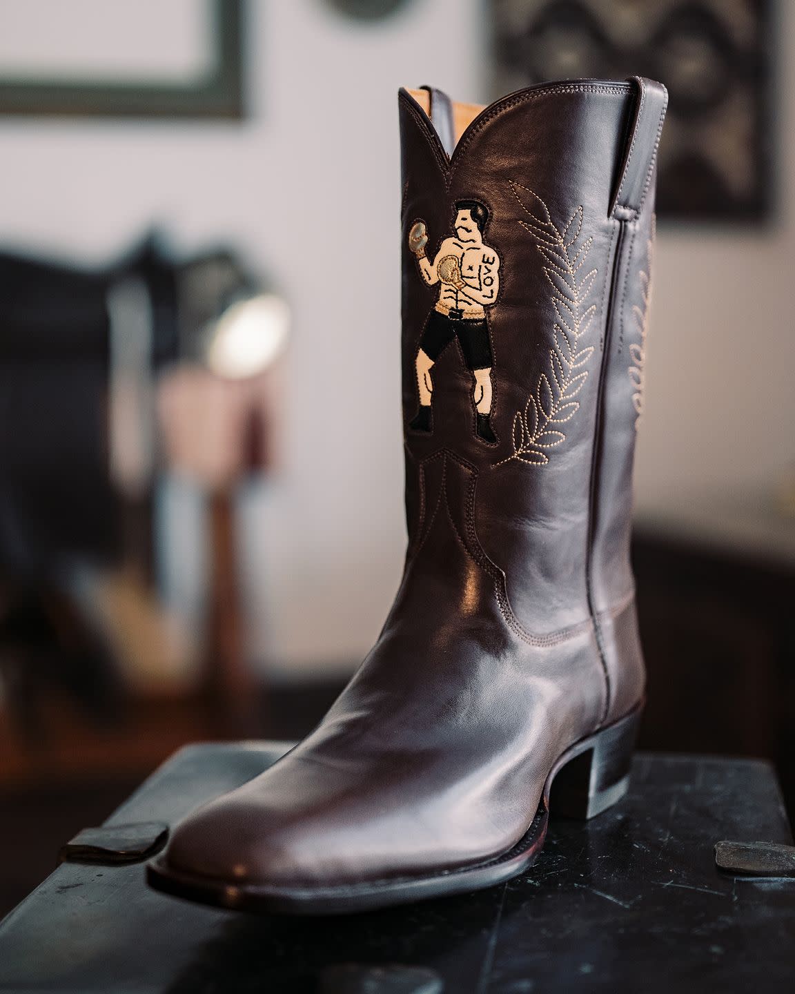 a boot with a painting on it