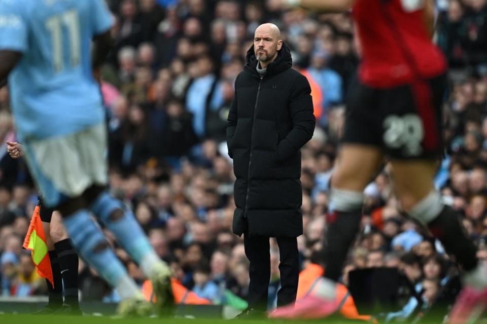 Erik ten Hag watches on as Man City beat Man United (AFP via Getty Images)