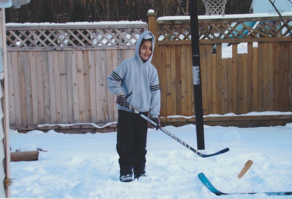 Arshdeep Bains, seen here at the age of 7, was a huge hockey fan growing up in Surrey.