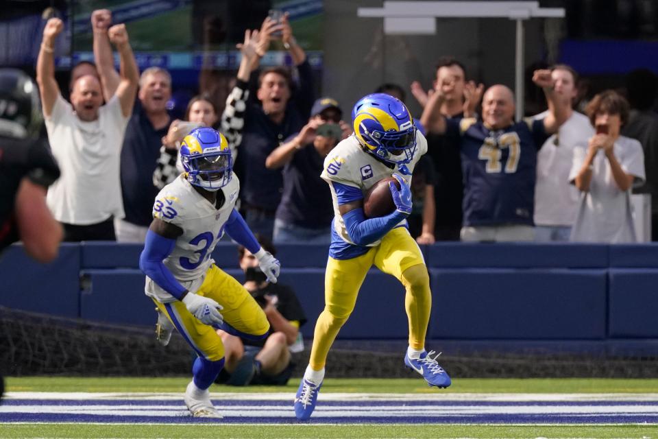 Los Angeles Rams cornerback Jalen Ramsey (5) runs with the ball after intercepting a pass during the second half of an NFL football game against the Atlanta Falcons Sunday, Sept. 18, 2022, in Inglewood, Calif. (AP Photo/Mark J. Terrill)