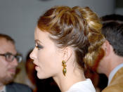 <div class="caption-credit"> Photo by: Getty Images</div><div class="caption-title">Olivia Wilde</div>"Braids are really big right now," says Palacios, who loves Wilde's original twist on the style. For a similar look, tease a high, messy ponytail and braid from root to end. Tuck the puffy braid at the nape of your neck, and pin in place. Palacios recommends adding a few extra pins at the side of the braid to ensure that it doesn't flop about. <br> <br> <b>More from REDBOOK:</b> <br> <ul> <li> <a rel="nofollow noopener" href="http://www.redbookmag.com/beauty-fashion/tips-advice/winter-accessories?link=rel&dom=yah_life&src=syn&con=blog_redbook&mag=rbk" target="_blank" data-ylk="slk:100 Cute, Affordable Winter Accessories;elm:context_link;itc:0;sec:content-canvas" class="link "><b>100 Cute, Affordable Winter Accessories</b></a> </li> <li> <a rel="nofollow noopener" href="http://www.redbookmag.com/beauty-fashion/tips-advice/celebrity-makeup-looks?link=rel&dom=yah_life&src=syn&con=blog_redbook&mag=rbk" target="_blank" data-ylk="slk:The 50 Most Iconic Beauty Looks of All Time;elm:context_link;itc:0;sec:content-canvas" class="link "><b>The 50 Most Iconic Beauty Looks of All Time</b></a> </li> </ul>