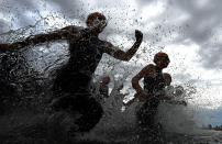 <p>Competitors run into the water during the Elwood Triathlon on November 26, 2017 in Melbourne, Australia. (Photo by Quinn Rooney/Getty Images) </p>