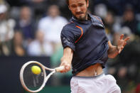 Daniil Medvedev of Russia returns the ball to Denmark's Holger Rune during the men's final tennis match at the Italian Open tennis tournament in Rome, Italy, Sunday, May 21, 2023. (AP Photo/Alessandra Tarantino)