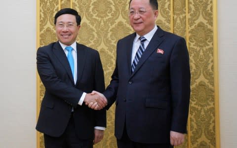 North Korean Foreign Minister Ri Yong Ho welcomes his Vietnamese counterpart to Pyongyang in February - Credit: Ng Han Guan/AP