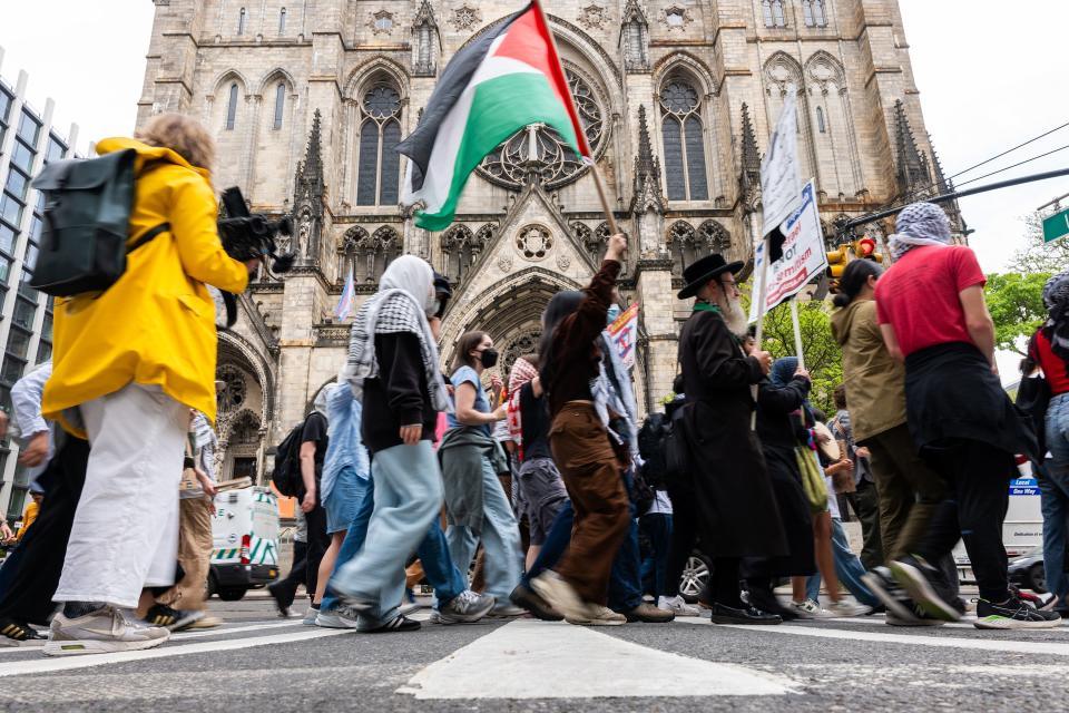 May 6, 2024: Pro-Palestinian protesters walk from Columbia University down to Hunter College as protests at area universities and colleges continue in New York City. Across the nation, students and activists angered by Israel's war in Gaza have been building encampments, taking over buildings, disrupting graduations, and demanding that their schools divest from Israel. Columbia University announced today that they are canceling the group graduation ceremony and will instead hold numerous smaller ones outside of the main campus.