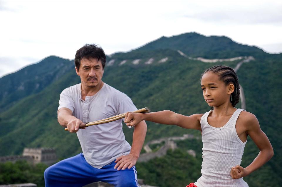 Jackie Chan trains with Jaden Smith next to the Great Wall of China.