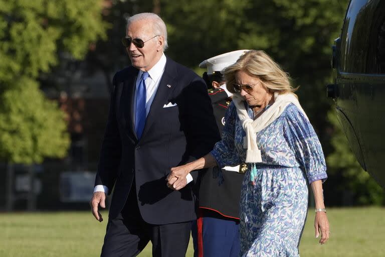 FILE - President Joe Biden, left, and first lady Jill Biden hold hands as they arrive at Fort Lesley J. McNair, Monday, July 1, 2024, in Washington. President Joe Biden dropped out of the 2024 race for the White House on Sunday, July 21, ending his bid for reelection following a disastrous debate with Donald Trump that raised doubts about his fitness for office just four months before the election. (AP Photo/Jacquelyn Martin, File)