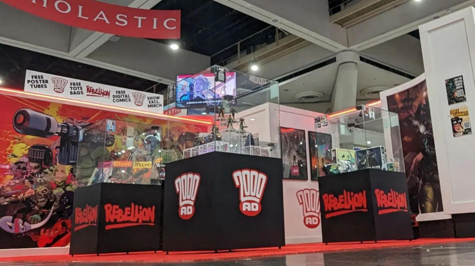 a stand full of merchandise at San Diego Comic-Con 2023