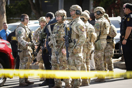 San Mateo County SWAT team officers are seen near Youtube headquarters following an active shooter situation in San Bruno, California, U.S., April 3, 2018. REUTERS/Elijah Nouvelage