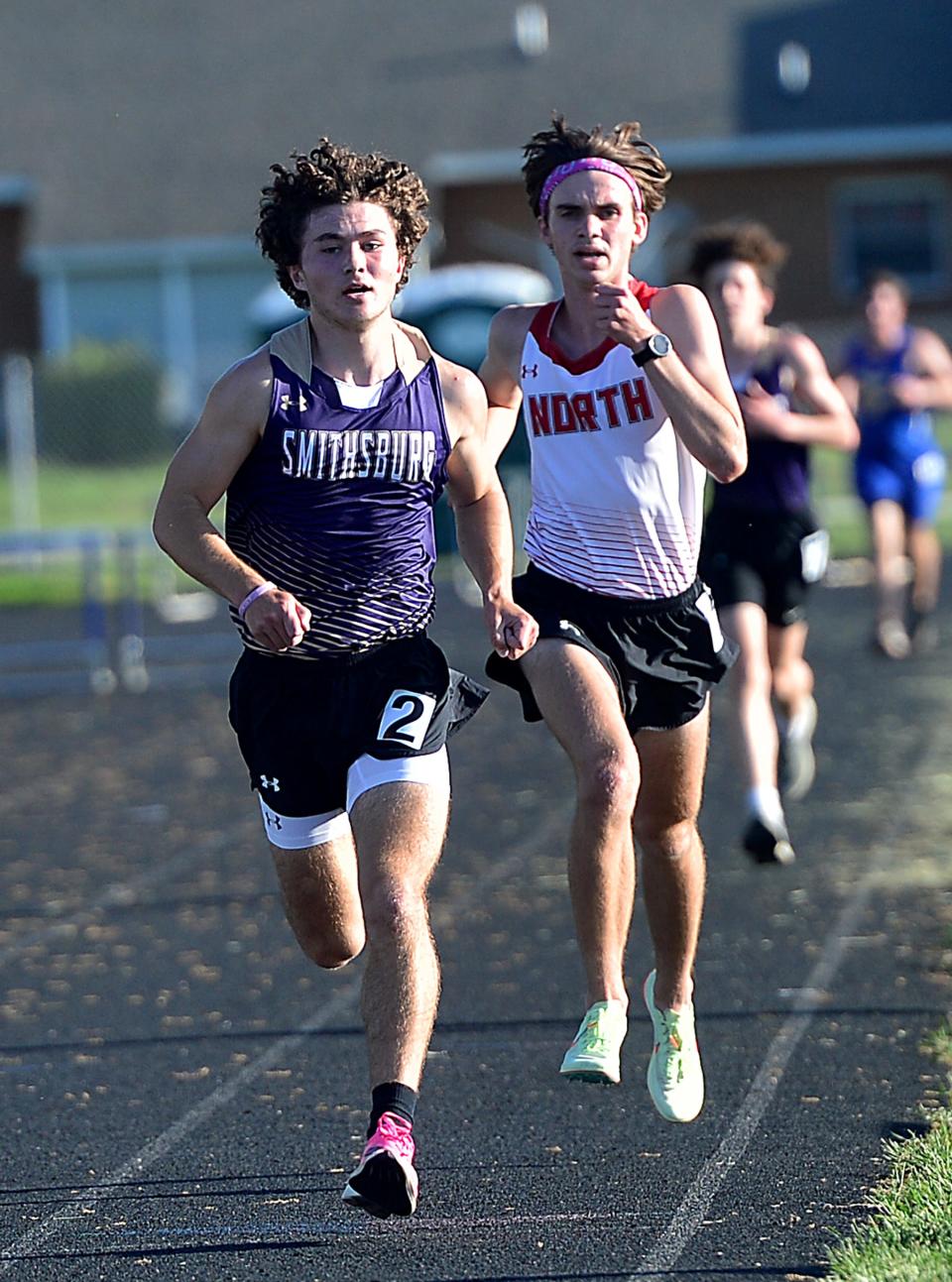 Smithsburg's Sean Milligan wins the boys 3,200 and North High's Alex Duncan finishes second during the Washington County Track & Field Championships at Boonsboro.