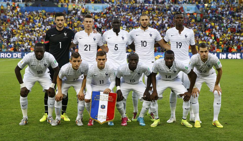 France's national soccer players pose for a team photo before their 2014 World Cup Group E soccer match against Ecuador at the Maracana stadium in Rio de Janeiro June 25, 2014. REUTERS/Kai Pfaffenbach