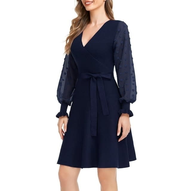 model wearing the navy blue dress