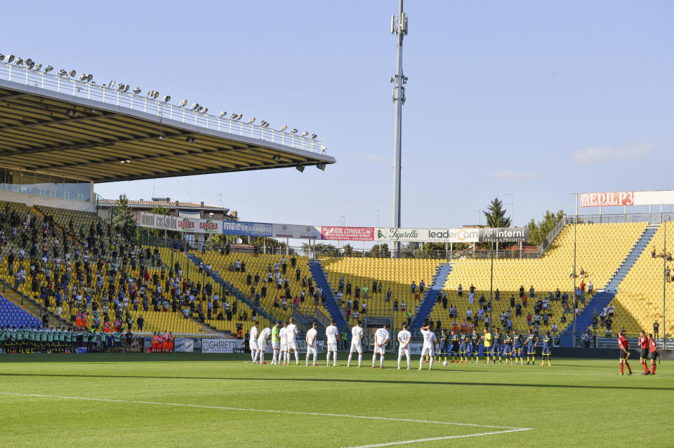 Fans wait for the start of a friendly match between Parma and Empoli at the Ennio Tardini stadium in Parma Sunday, Sept. 6, 2020. For the first time since the start of the COVID-19 pandemic, the stadium was opened for 1,000 fans. (Massimo Paolone/LaPresse via AP)