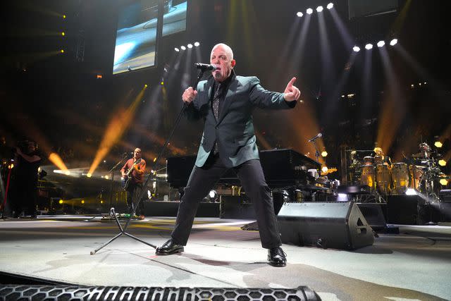 <p>Kevin Mazur/Getty</p> Billy Joel performs in New York City in August 2022
