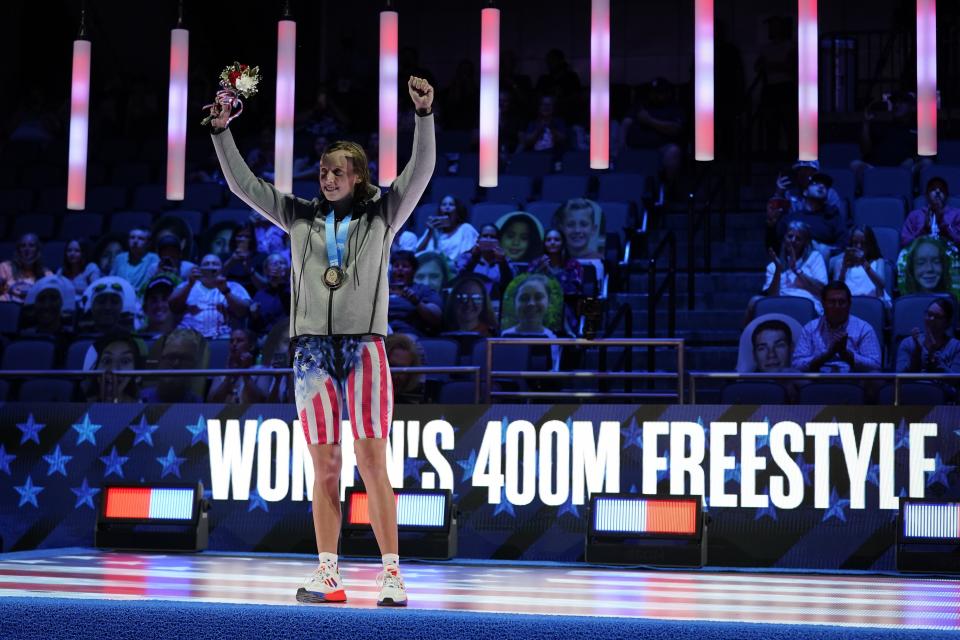 Katie Ledecky reacts at the medal ceremony after winning the Women's 400 Freestyle during wave 2 of the U.S. Olympic Swim Trials on Monday, June 14, 2021, in Omaha, Neb. (AP Photo/Charlie Neibergall)