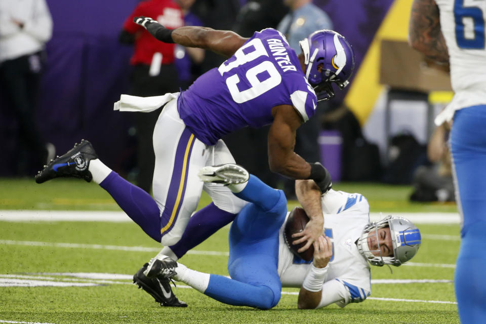Detroit Lions quarterback David Blough (10) is sacked by Minnesota Vikings defensive end Danielle Hunter (99) during the first half of an NFL football game, Sunday, Dec. 8, 2019, in Minneapolis. (AP Photo/Bruce Kluckhohn)