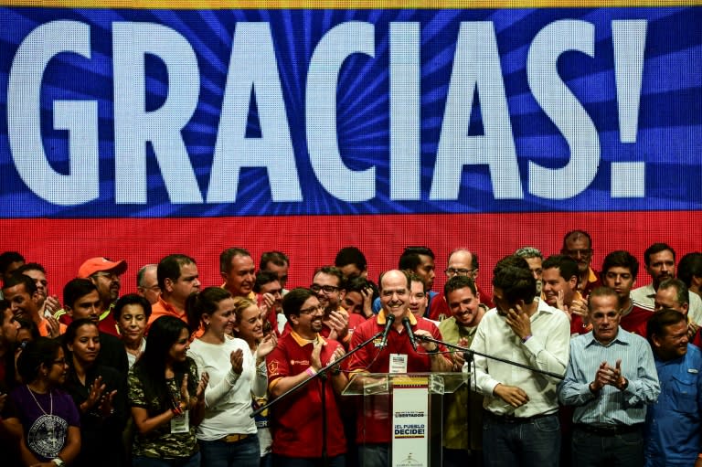 Julio Borges (C), leader of Venezuela's opposition-controlled legislature, says the vote result shows a public desire to see President Nicolas Maduro leave power before the end of his term in 2019