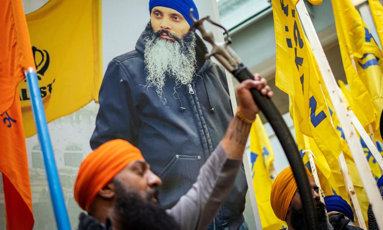 <span>Protesters outside the consulate general of India during a protest against the killing of Hardeep Singh Nijjar in Vancouver, British Columbia, on 24 June 2023.</span><span>Photograph: Ethan Cairns/AP</span>