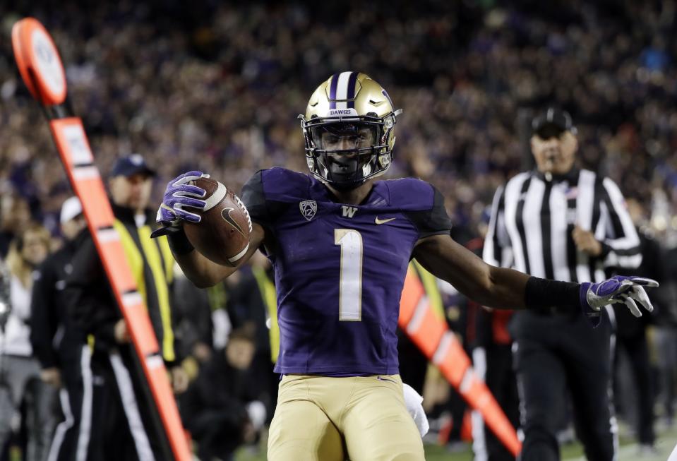 Washington WR John Ross clocked an unofficial 4.22 40-yard dash. (AP)