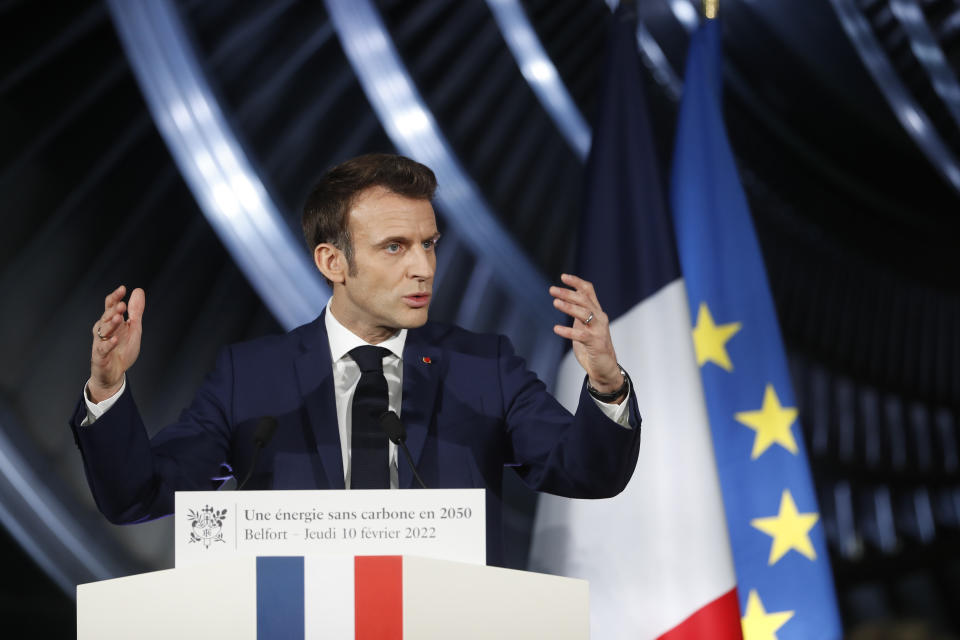 French President Emmanuel Macron delivers a speech at the GE Steam Power System main production site for its nuclear turbine systems in Belfort, eastern France, Thursday, Feb. 10, 2022. French President Emmanuel Macron unveiled plans to build new nuclear reactors in the country as part of its energy strategy to reduce planet-warming emissions. (AP Photo/Jean-Francois Badias, Pool)