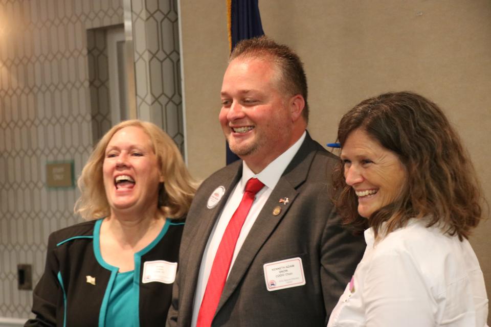 Washington County Clerk Susan Lewis, left, County Commissioner Adam Snow, center, and Lesa Sandberg, the chair of the county Republican Party, pose for a photo after Lewis and Snow were appointed to office during a special election on July 20, 2021.