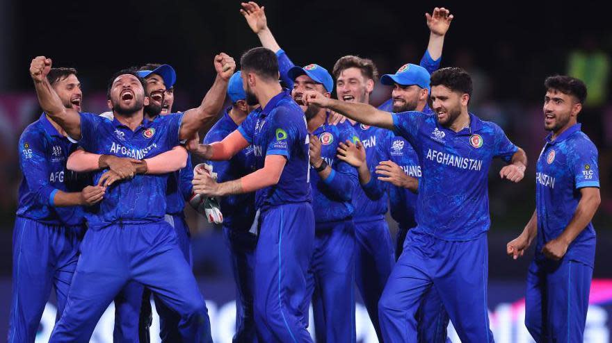 Afghanistan's Gulbadin Naib celebrates a wicket against Australia during the T20 World Cup 2024