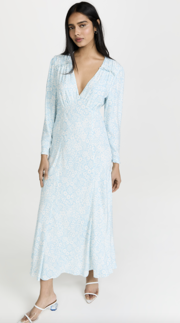 model with long black hair in light blue and white long sleeved Rixo Clover Dress (Photo via Shopbop)