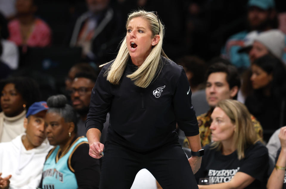 Indiana Fever head coach Christie Sides directs her team during the second half of a WNBA basketball game against the New York Liberty, Saturday, May 18, 2024, in New York. The New York Liberty won 91-80. (AP Photo/Noah K. Murray)