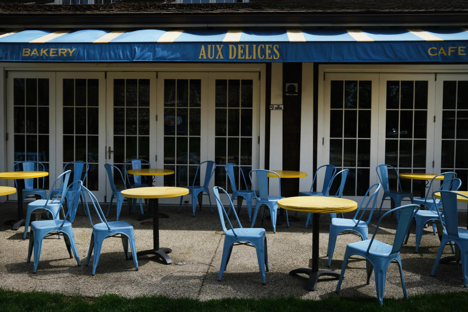 WESTPORT, CONNECTICUT - MAY 05: A cafe along a shopping street in the affluent community remains mostly empty of pedestrians and open stores on May 05, 2020 in Westport, Connecticut. A growing number of states have begun reopening parts of the economy amid demonstrations like the one yesterday that targeted the Connecticut state capital and the governor's mansion in Hartford. (Photo by Spencer Platt/Getty Images)