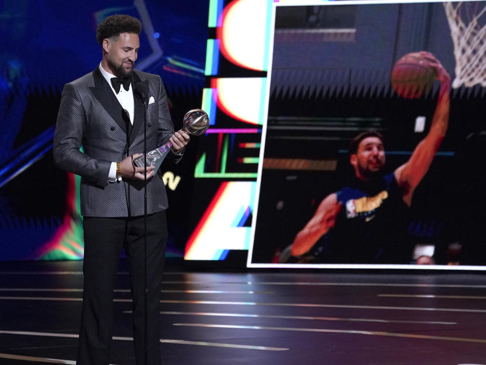 NBA player Klay Thompson, of the Golden State Warriors, accepts the award for best comeback athlete at the ESPY Awards on Wednesday, July 20, 2022, at the Dolby Theatre in Los Angeles. (AP Photo/Mark Terrill)