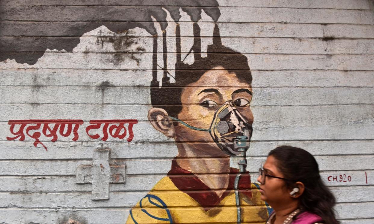<span>A mural depicting the air pollution that afflicts Mumbai, India, one of the world’s worst affected cities.</span><span>Photograph: Indranil Aditya/NurPhoto/Shutterstock</span>