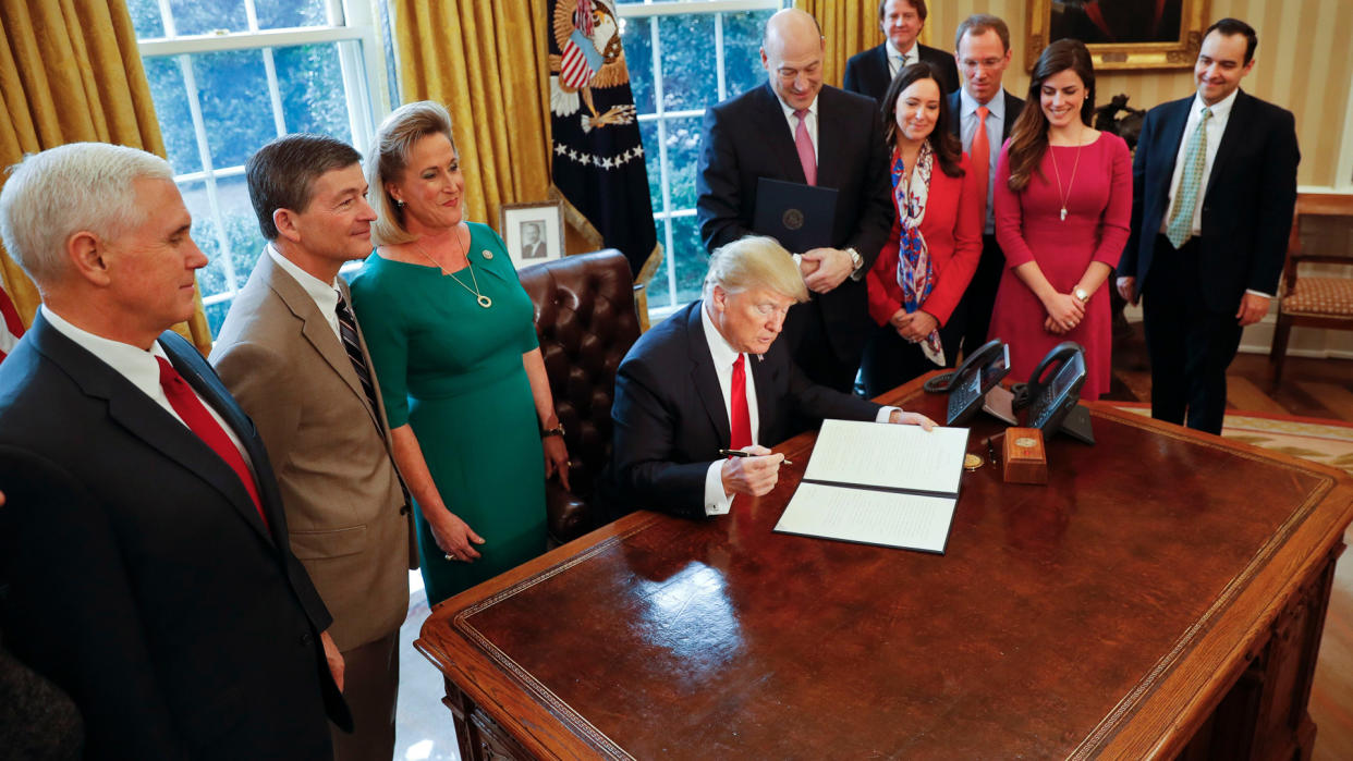 President Donald Trump signs act repealing Dodd Frank act