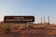 This Aug. 19, 2019, image shows the coal-fired Navajo Generating Station near Page, Ariz. The power plant will close before the year ends, upending the lives of hundreds of mostly Native American workers who mined coal, loaded it and played a part in producing electricity that powered the American Southwest. (AP Photo/Felicia Fonseca)